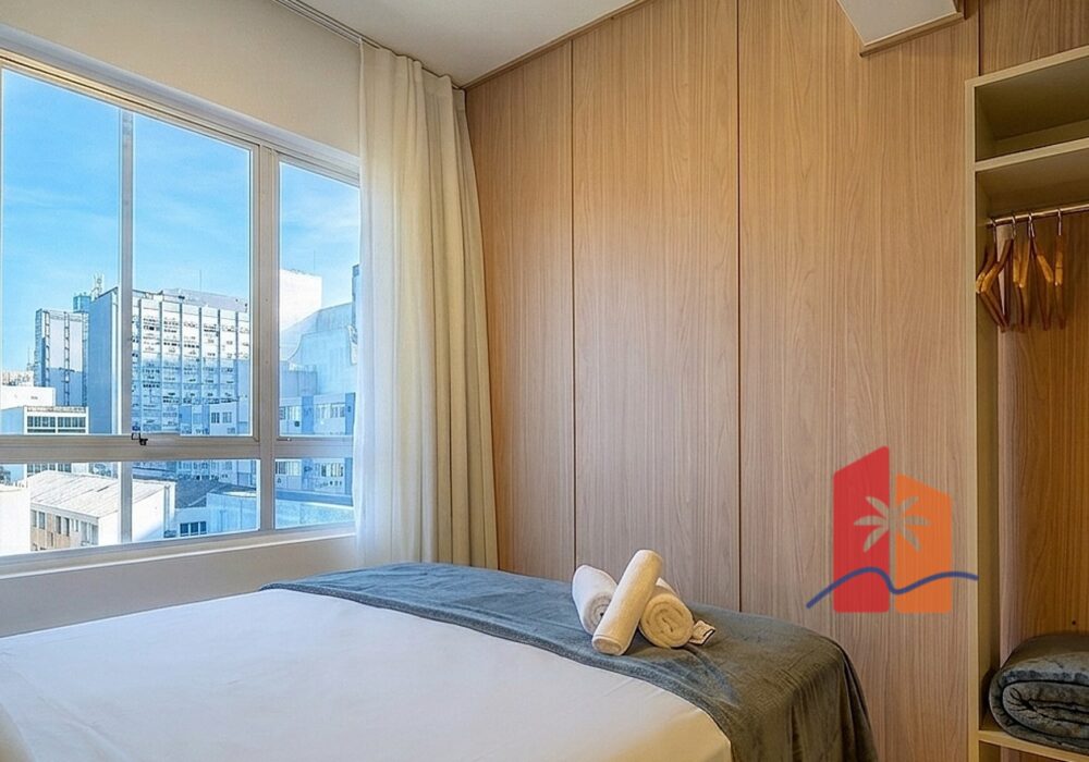 quarto_duplo_1_1__quarto+cama+vista_cidade