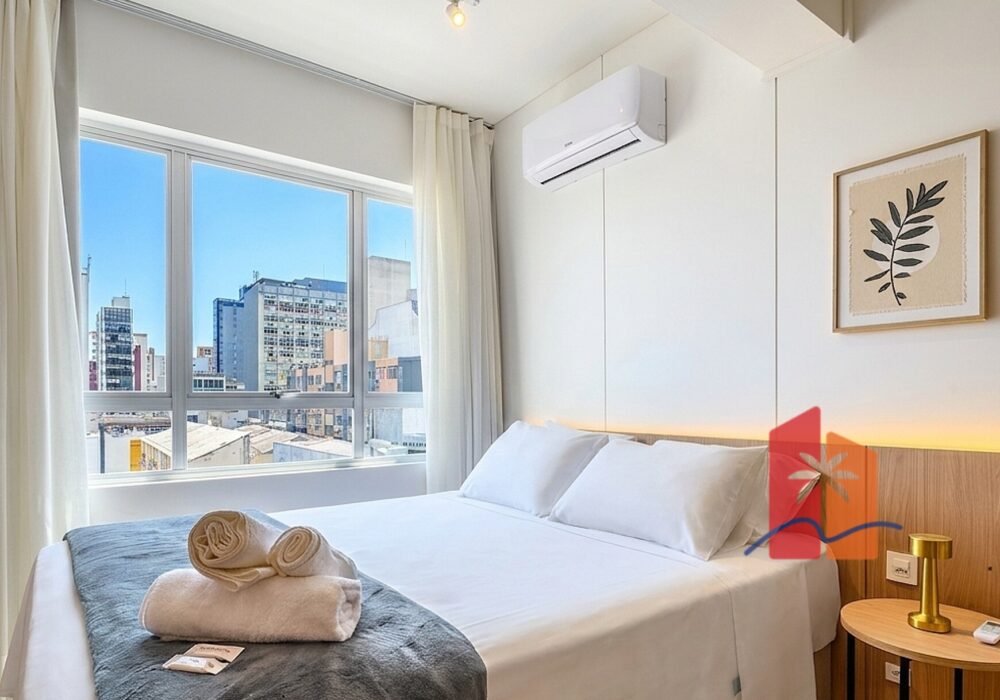 quarto_duplo_1_3__quarto+cama+vista_cidade